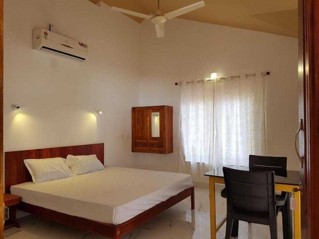 Kizhunna Rock Beach House Kannur Bagian luar foto